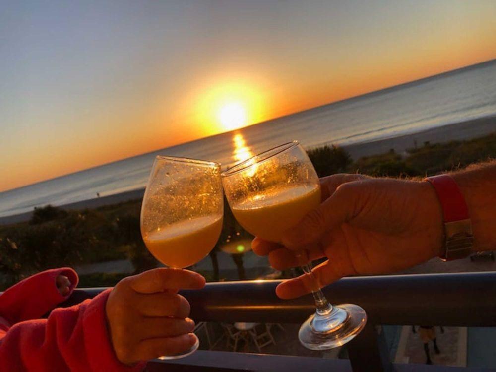 Sunset toast on the balcony